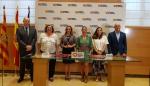 Acto de la firma del contrato entre la consejera Mayte Pérez y la compañía Indra para digitalizar los registros civiles de once partidos judiciales de Aragón