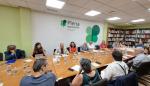 La consejera Carmen Susín y el gerente del IASS, Ángel Val, en la junta directiva de Plena Inclusión Aragón